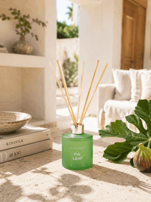 Fig Leaf home fragrance Mikado reed diffuser 100ml in a frosted green glass bottle with botanical illustration box, inspired by the elements of the Balearic earth, limited edition by Balearic Elements".